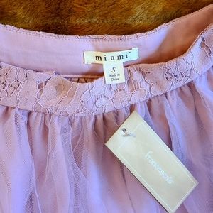 Flowing skirt new pink , short front long back